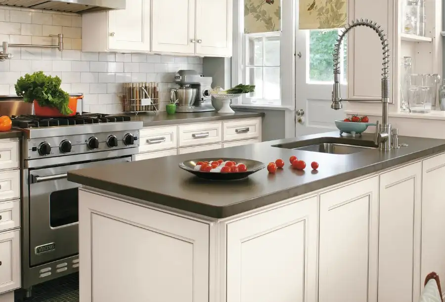 Cabinetland of Springfield, Inc. - remodeled kitchen, dark solid color countertops - Springfield, IL